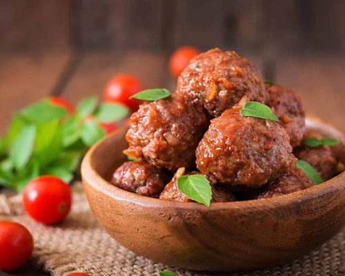 meatballs-sweet-sour-tomato-sauce-basil-wooden-bowl